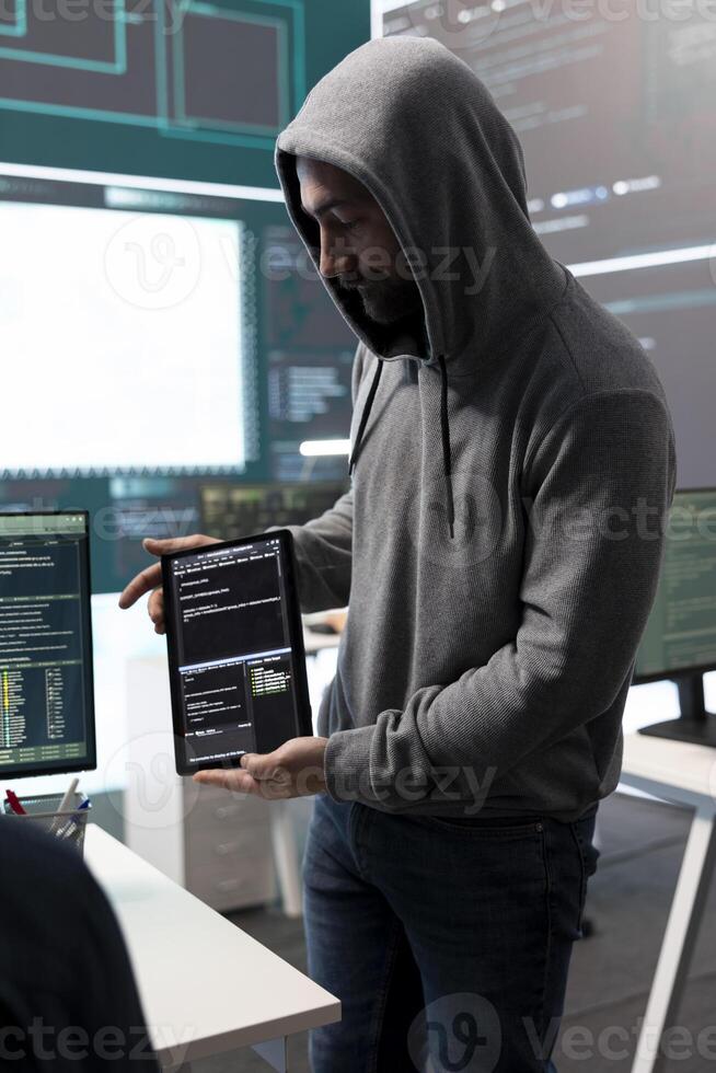 Cyber security experts team working on encryption and IT security in a governmental agency. Specialists working on cyber operations, network security and data protection for national safety. photo