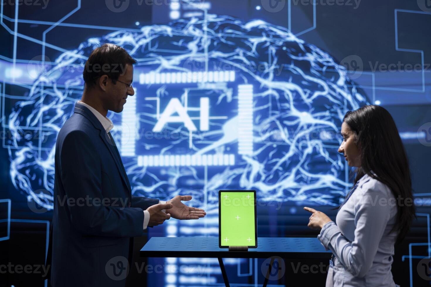 Engineer and supervisor use AI machine learning to extract information from complex data on isolated screen tablet. Experts in workspace use artificial intelligence technology on chroma key device photo