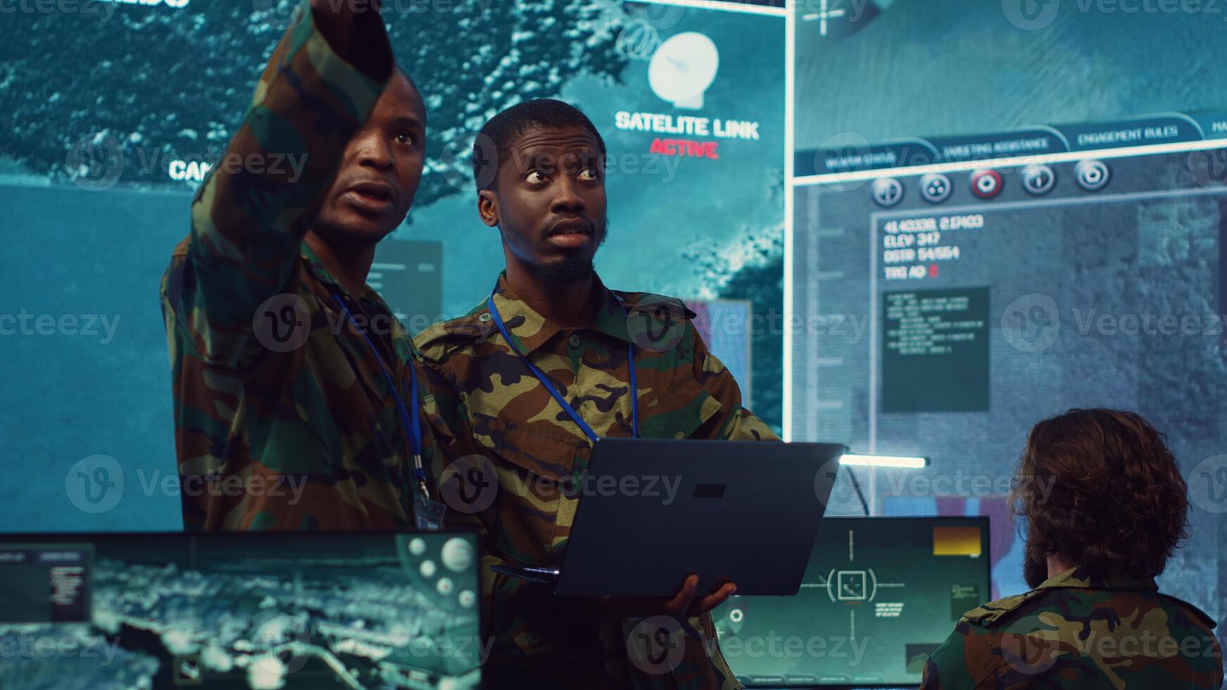 Army commanders overseeing field operations with real time data registered on surveillance CCTV systems. Military officials examining mission details, army defense program in power base. Camera A. photo