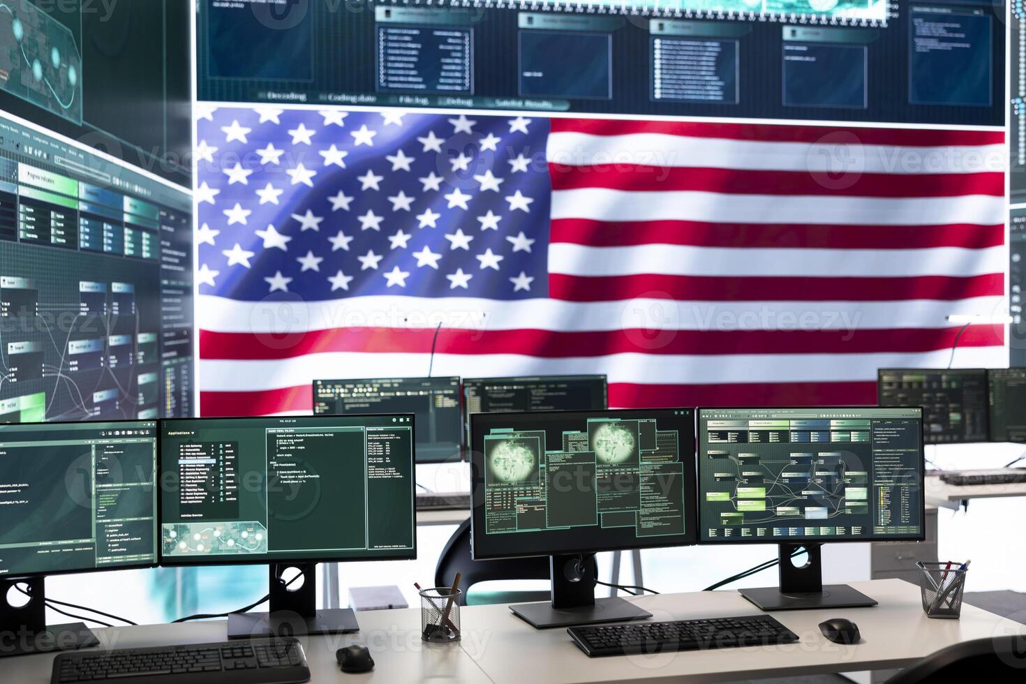 Empty governmental surveillance room shows an American flag, cybersecurity and data protection. High tech operations center focusing on threat and malware detection, security protocols. photo
