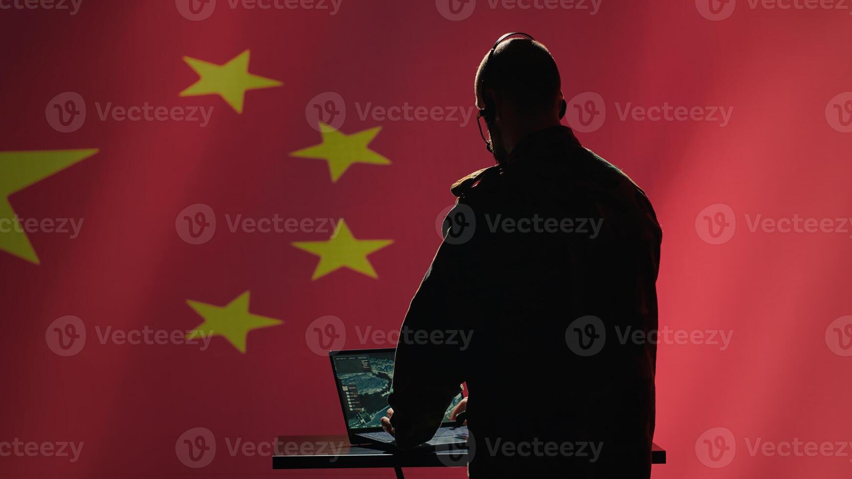 Chinese army communication systems operator using radio and satellite equipment, providing combat support. Military dispatcher managing communications networks, isolated over China flag, camera A photo
