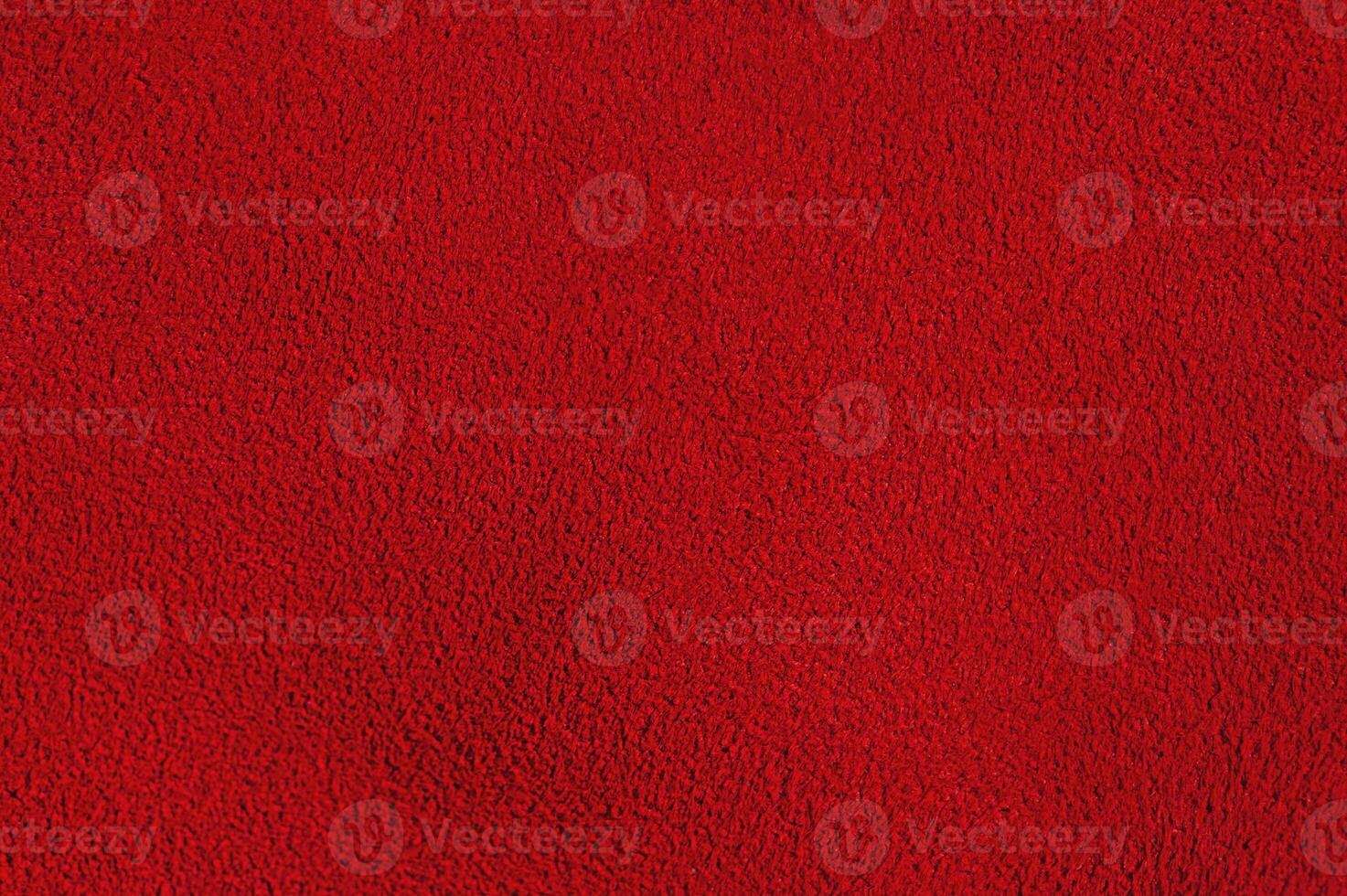 Red suede background macro photo. Suede texture. photo