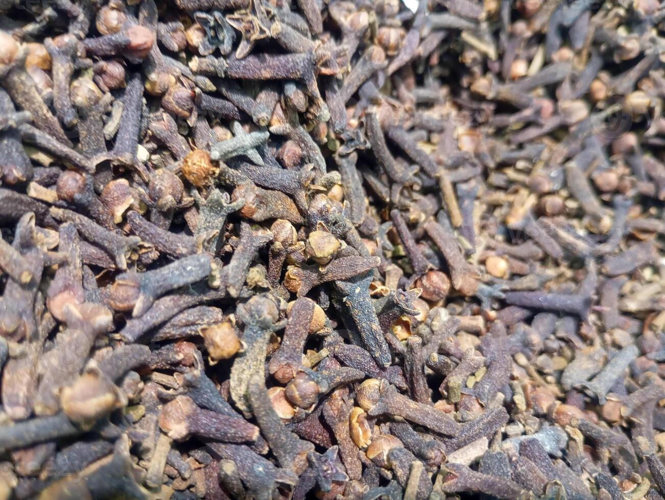Photo of a pile of cloves, an Indonesian spice.