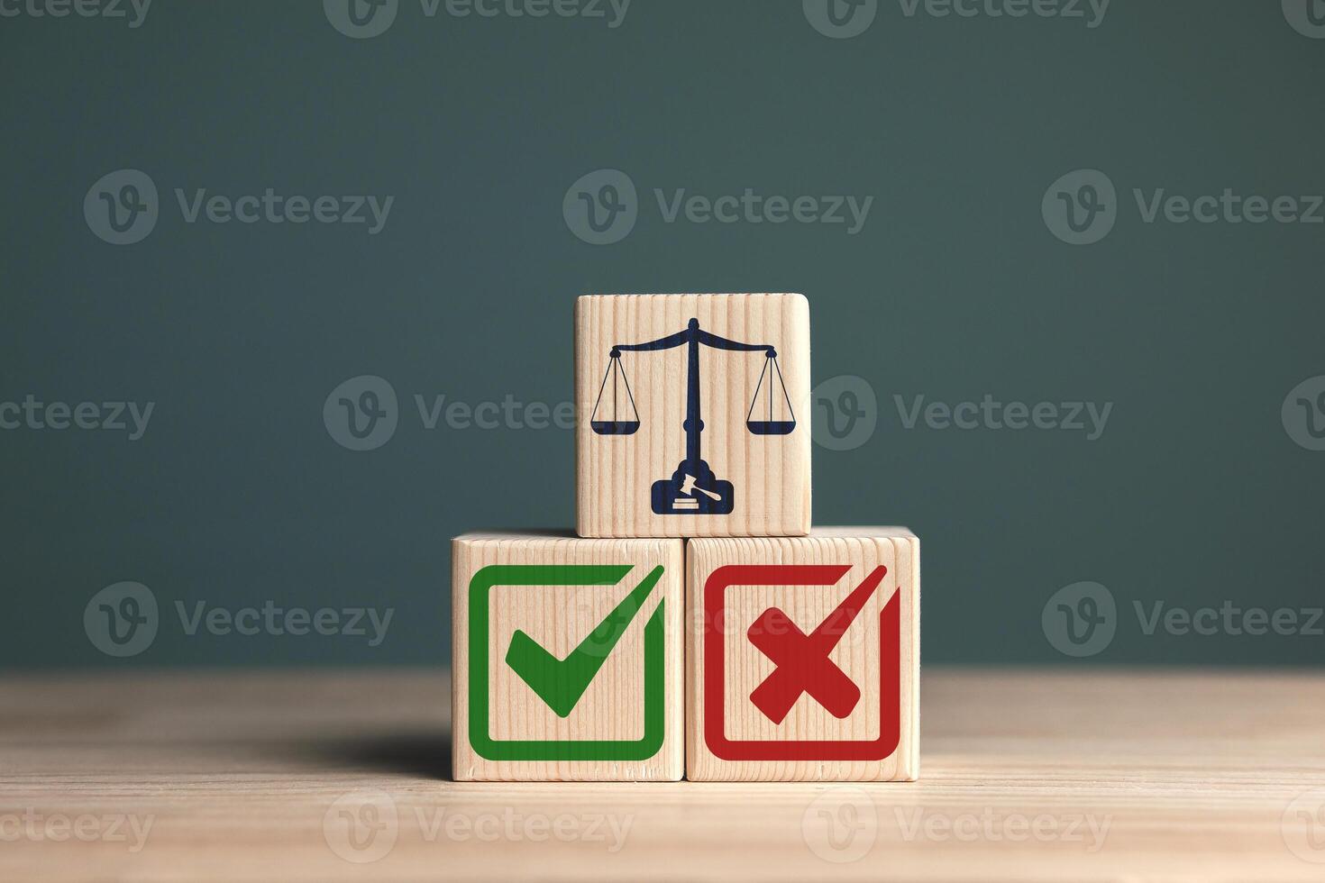 Scale icon with right and wrong symbols on wooden block. Concepts of legal and court decisions photo