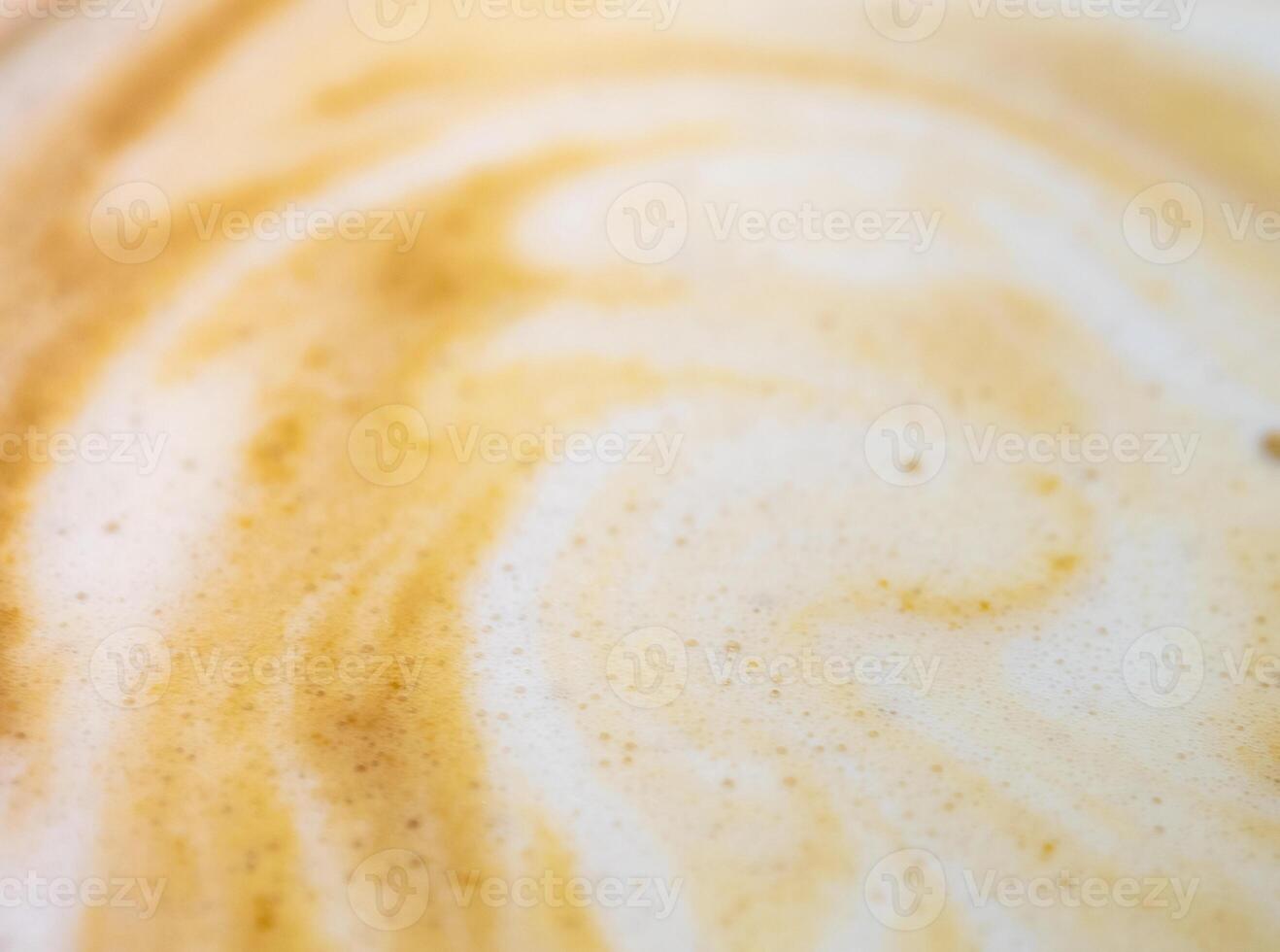 Texture surface of soft and delicate milk froth in a cup of coffee photo