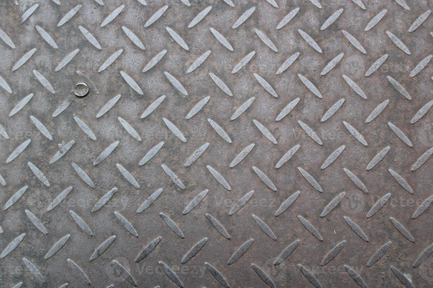 Close-up of a textured metal surface. photo