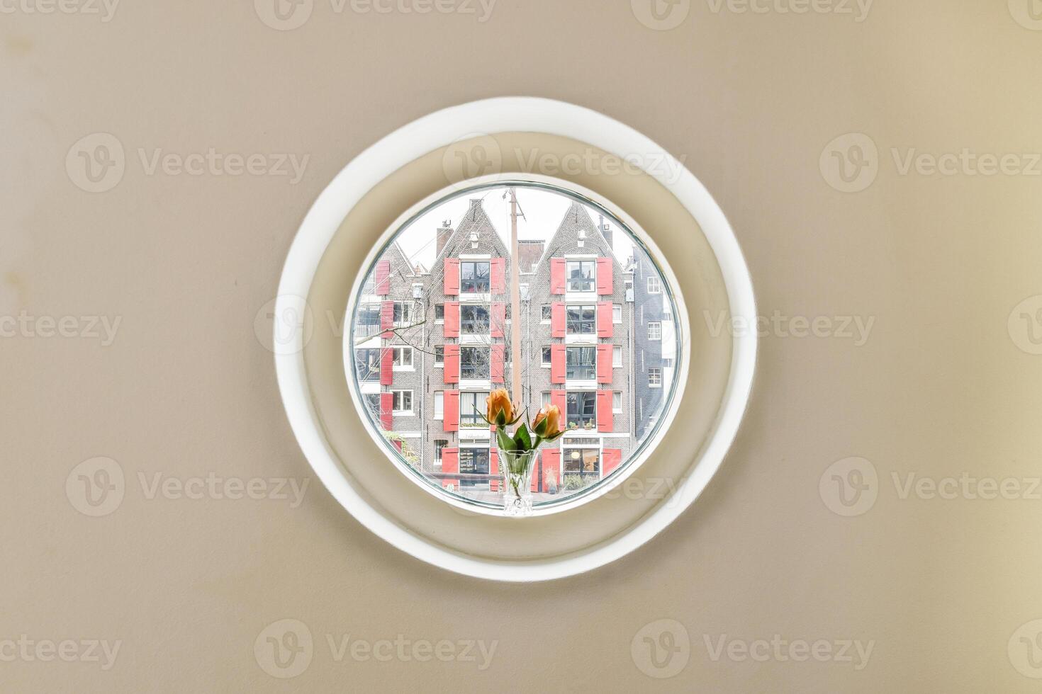 A round mirror on the wall photo