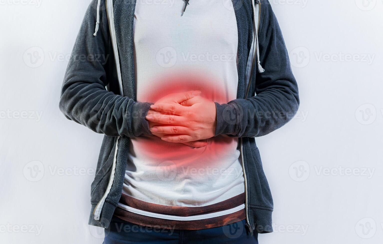 Person with digestive and stomach problems isolated. Unhappy man with digestive problems isolated photo