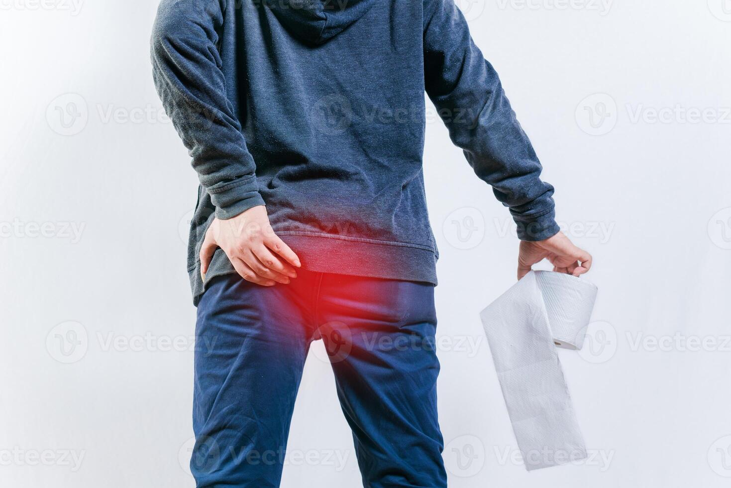 People with diarrhea problems, holding bathroom toilet paper isolated. Concept of person with diarhea holding toilet paper photo