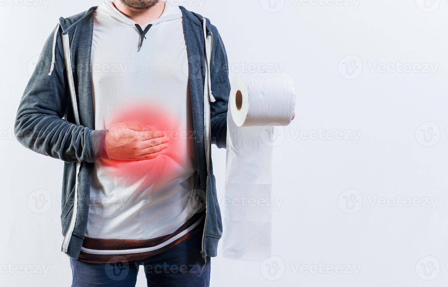 Unrecognizable person with diarhea holding toilet paper roll. Diarhea and stomach problems concept photo