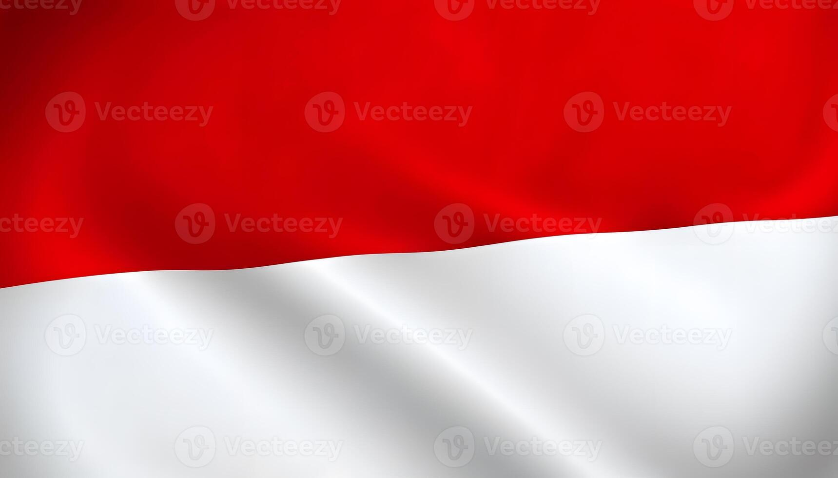 the flag of indonesia is flying in the wind photo