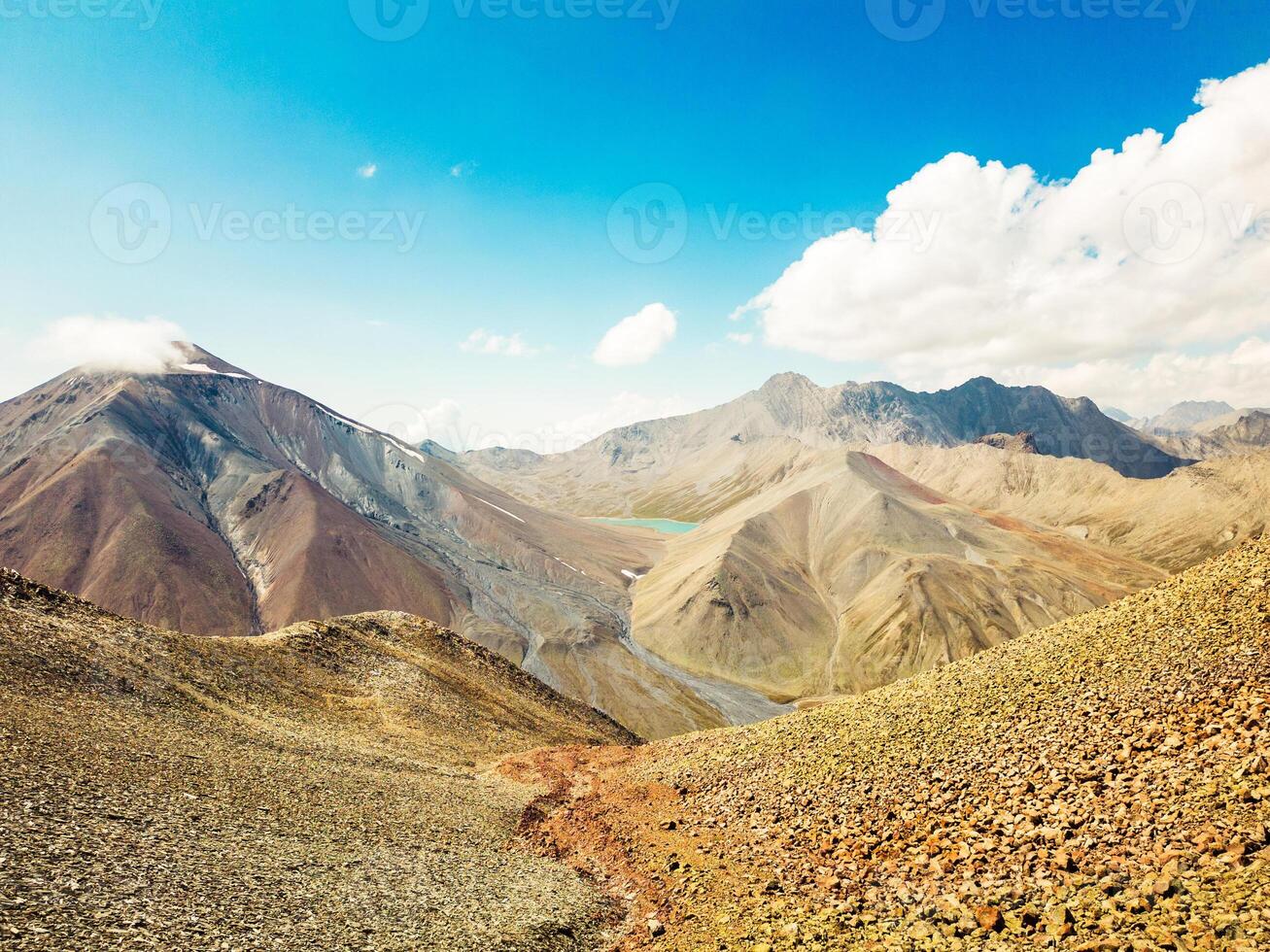 Aerial view Kelitsadi lake hiking trail through Khorisari pass. Keli volcanic plateau. Kazbegi national park photo