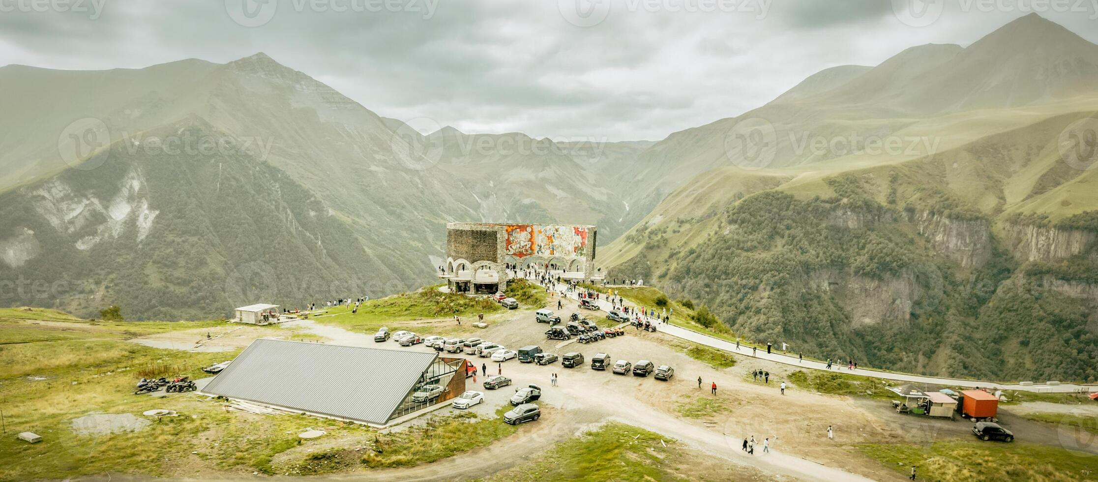 Aerial view of Russia Georgia Friendship Monument located on the Georgian Military Highway between the ski resort town of Gudauri and the Jvari pass, photo