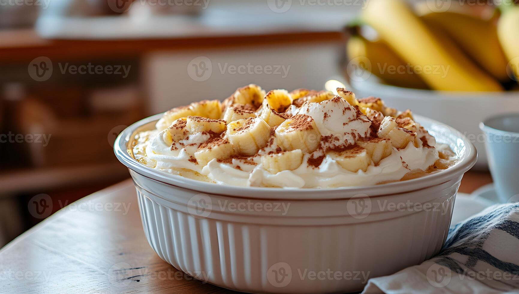 View of Nutritious Delicious ripe Banana Pudding in a bowl photo