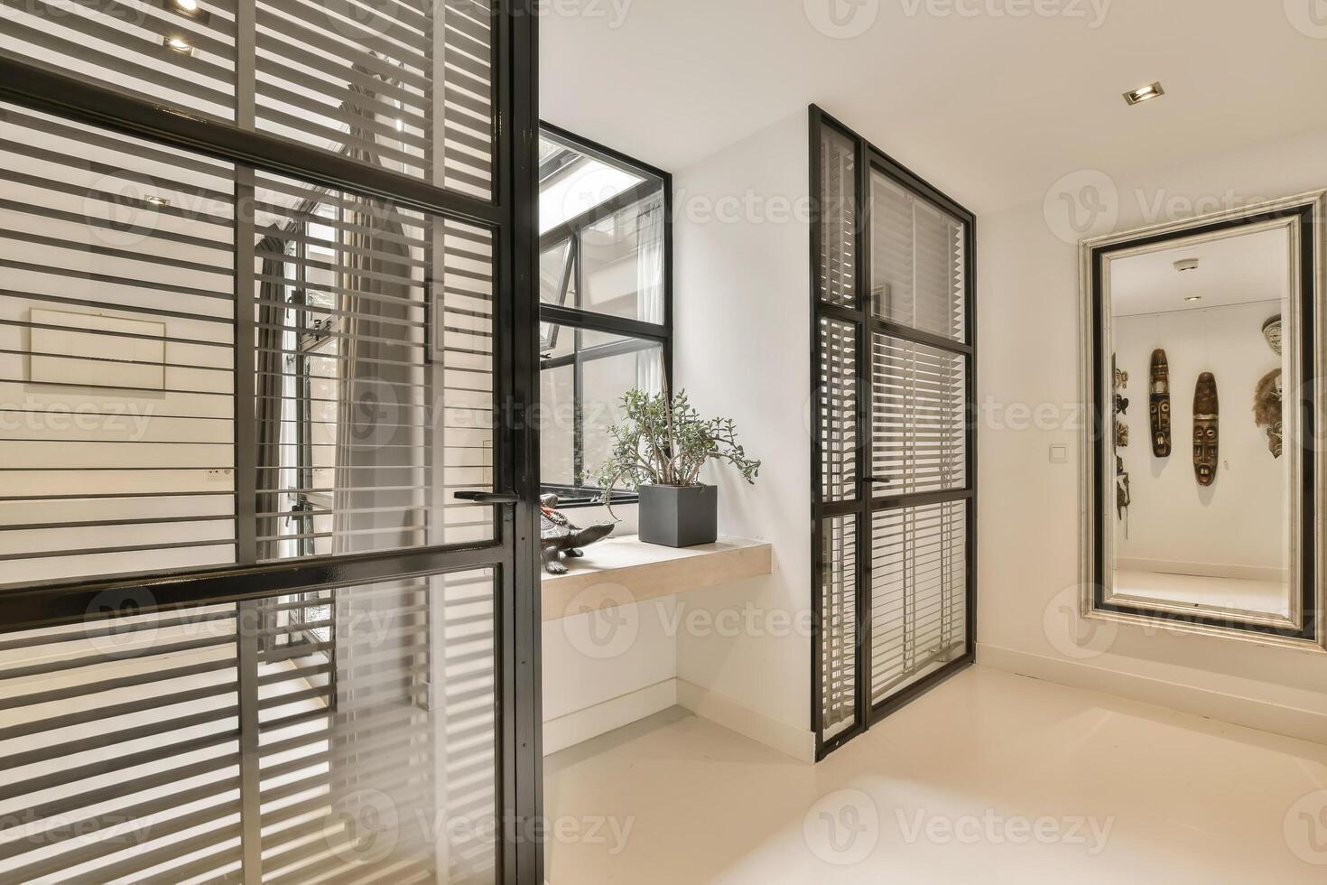 A bathroom with a mirror and sliding doors photo