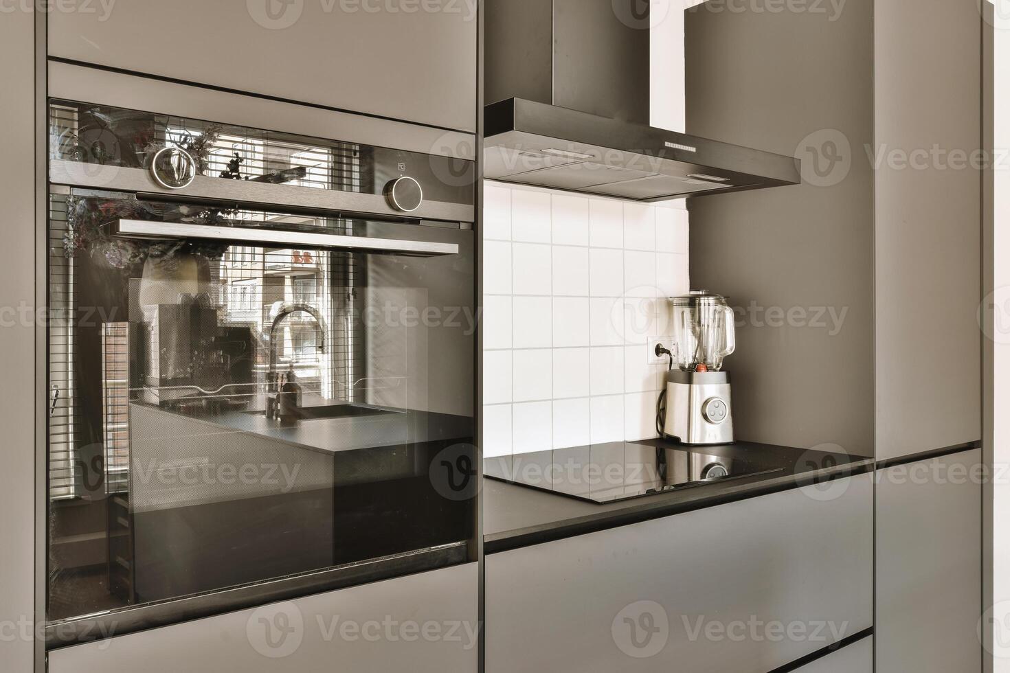 A modern kitchen with a black and white sink photo
