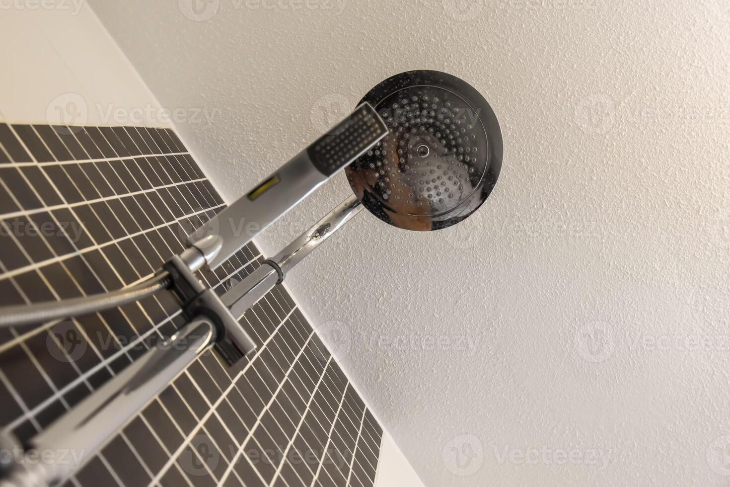 A shower head with a black and white shower head photo