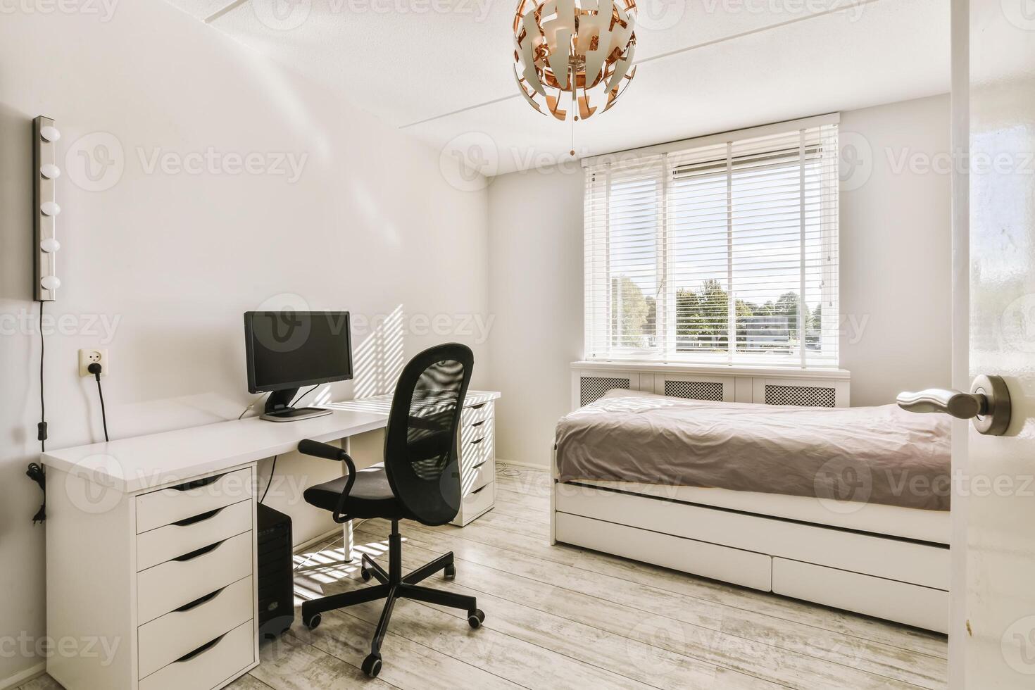 A bedroom with a desk, chair and bed photo