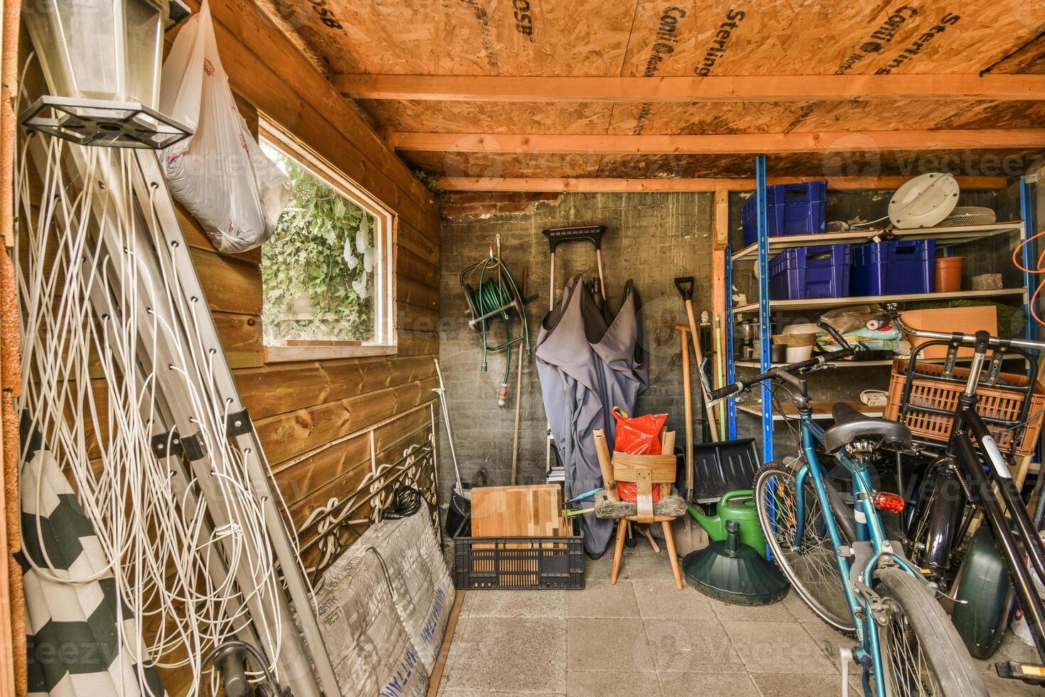A garage with a bike and tools photo