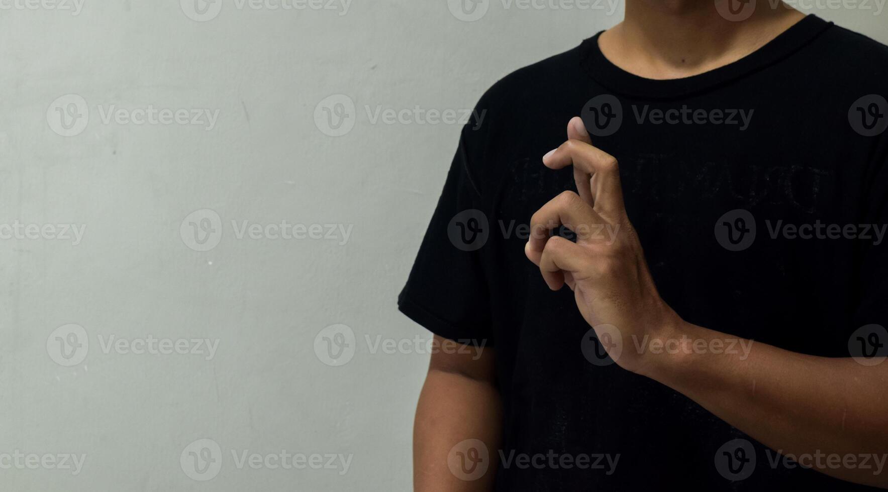 young man using sign language interpreter to communicate photo