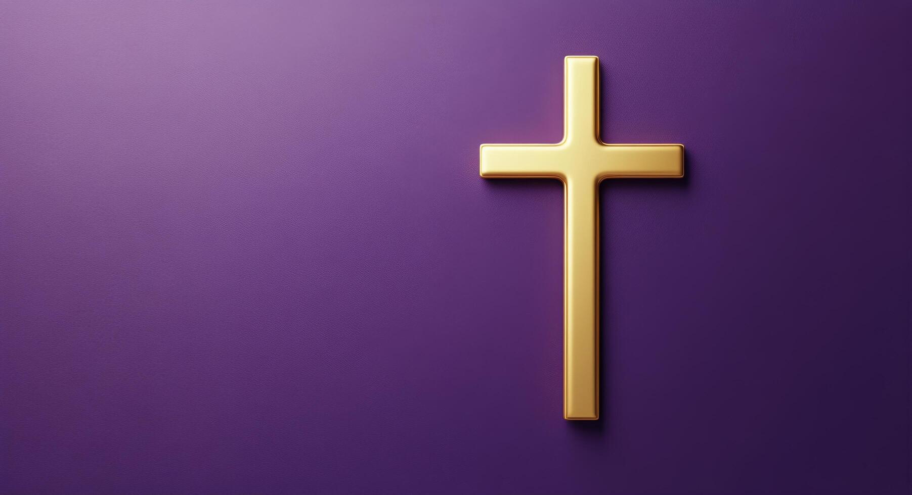 A golden cross on a rich purple background symbolizing faith and spirituality photo