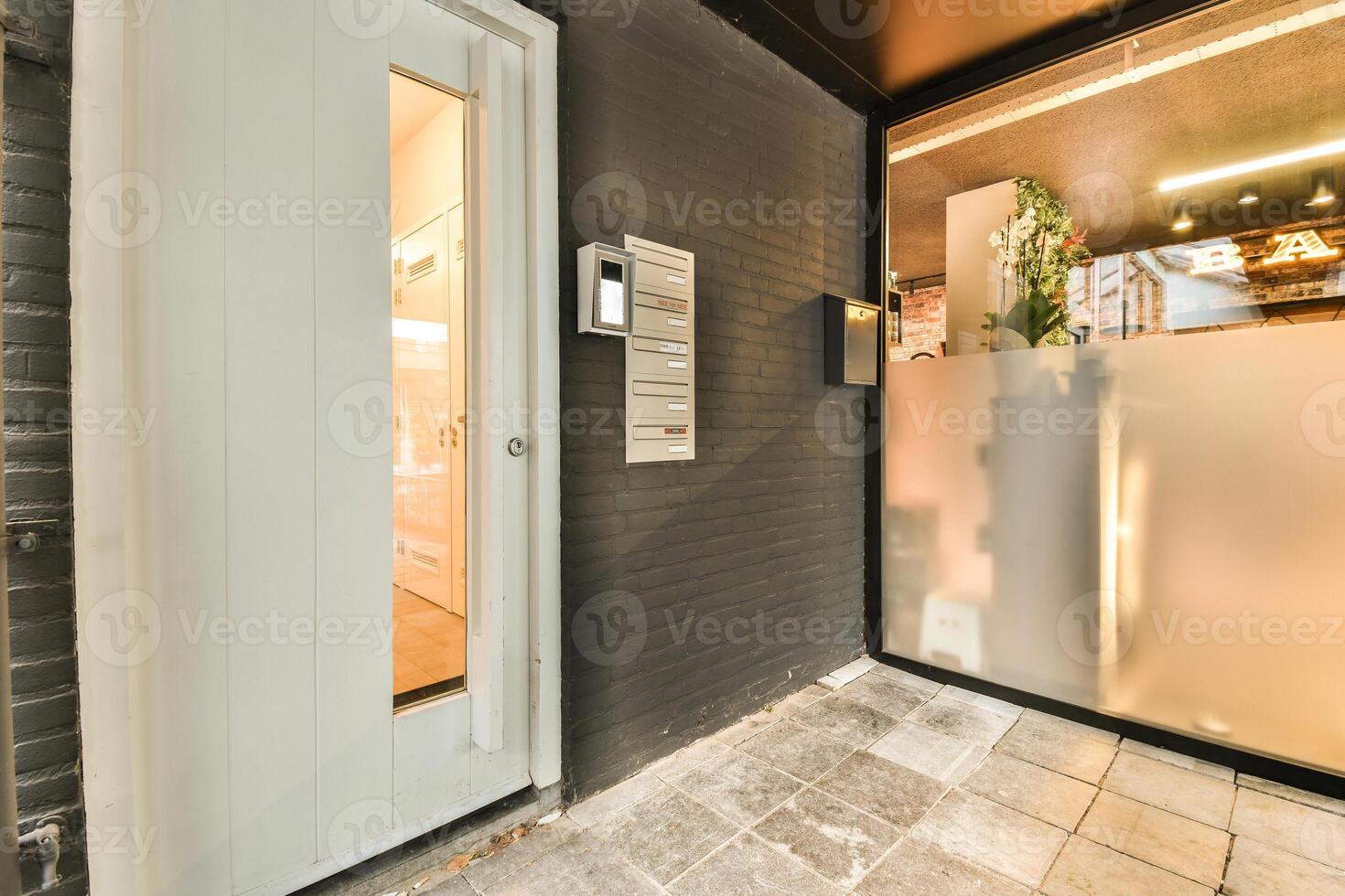 A door to a small apartment with a white door photo