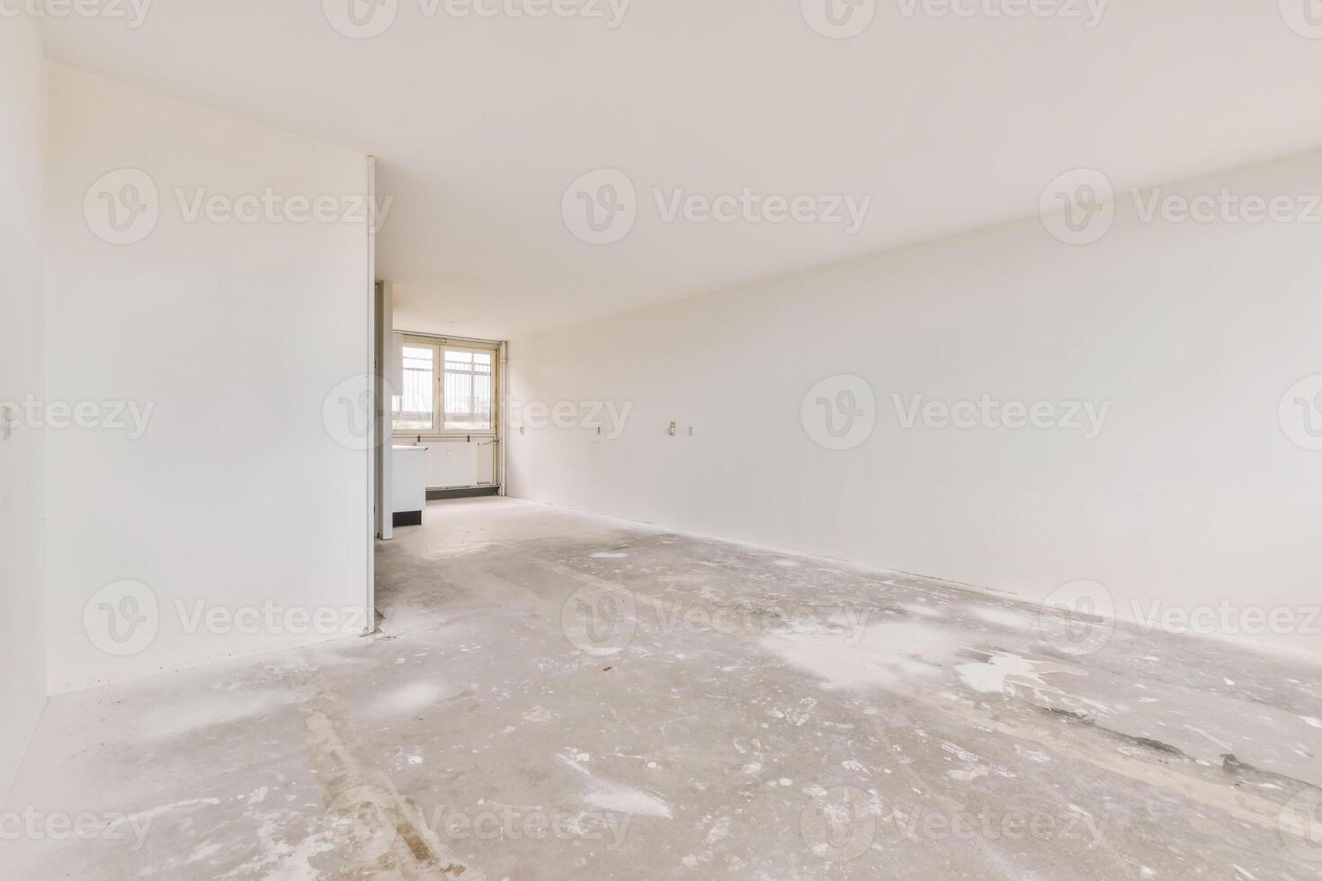 Empty room with white walls and a door photo
