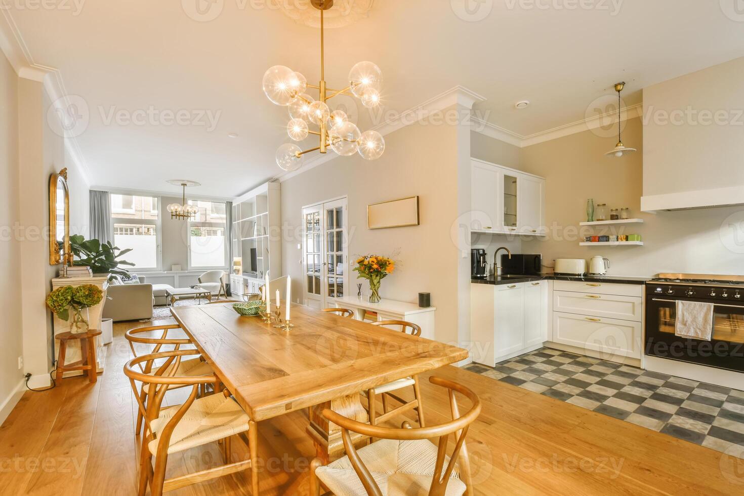 A dining room with a table and chairs photo