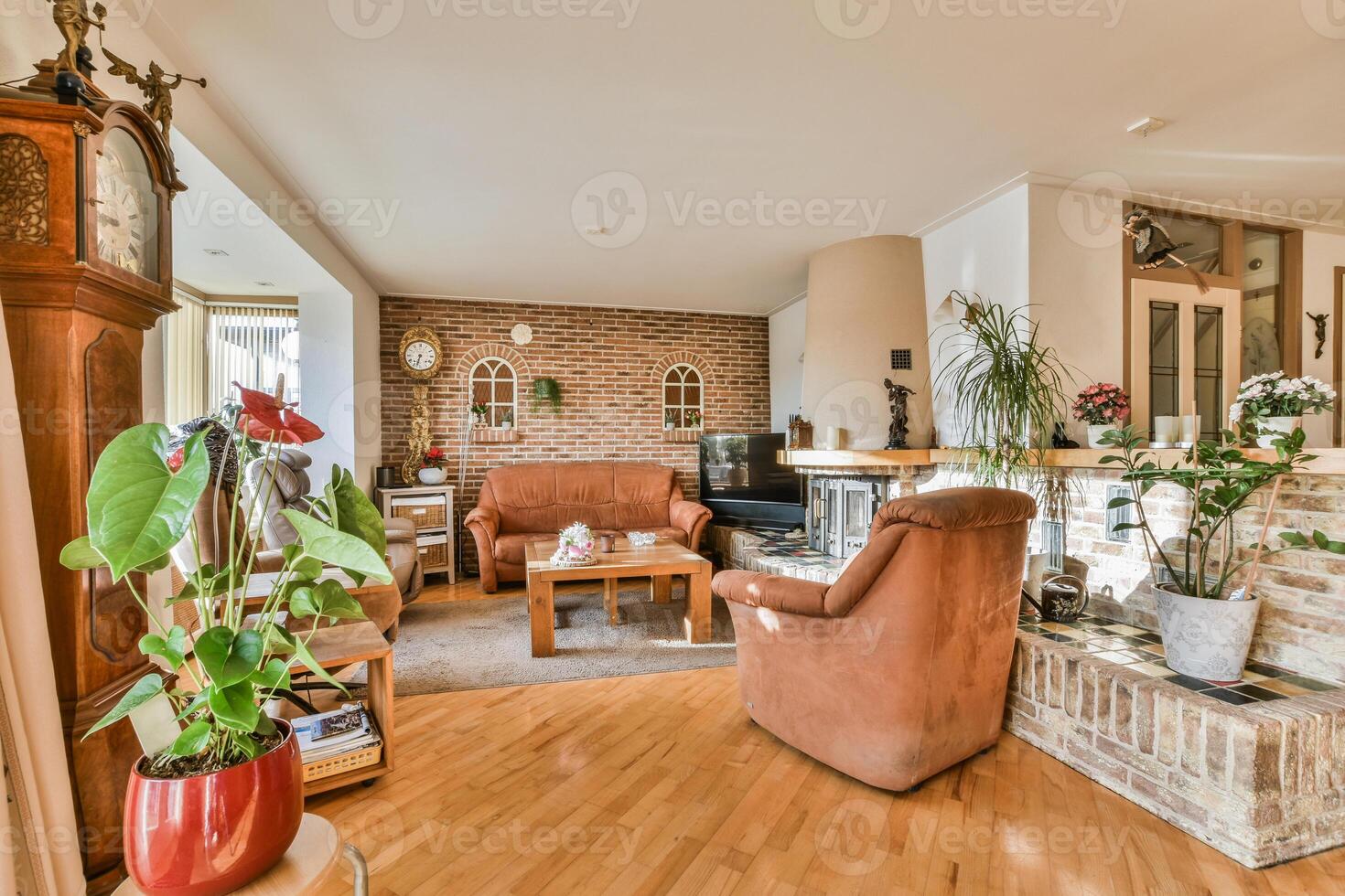 A living room with a couch and a chair photo