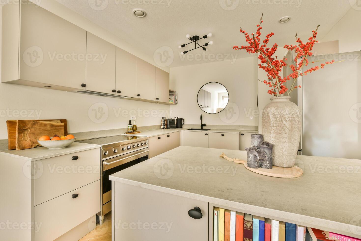 A kitchen with a vase on the counter photo
