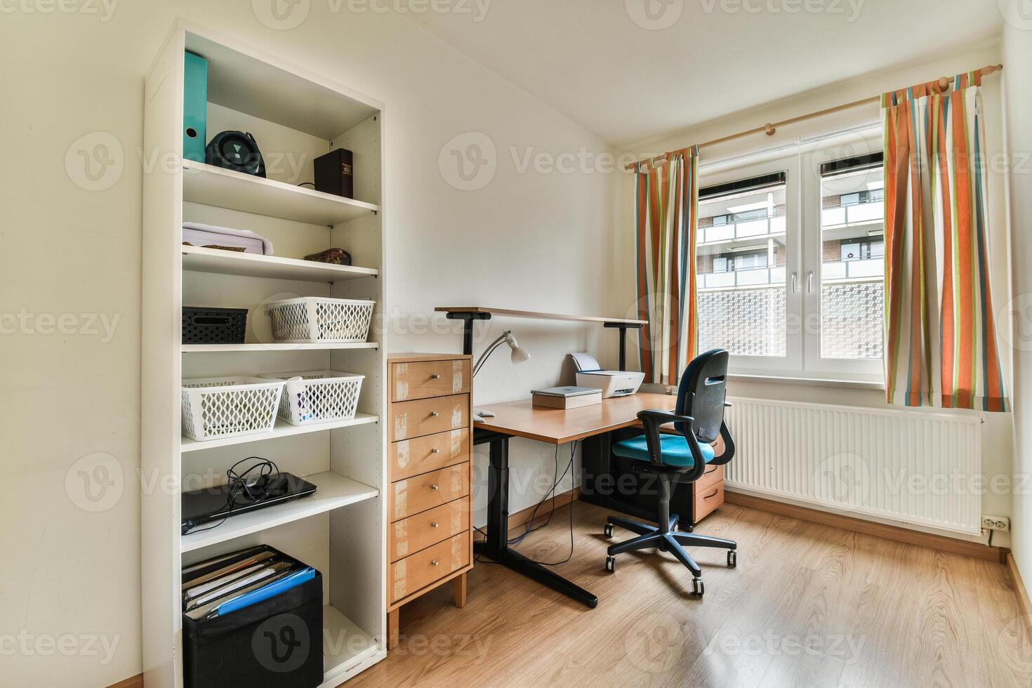 A desk with a chair photo