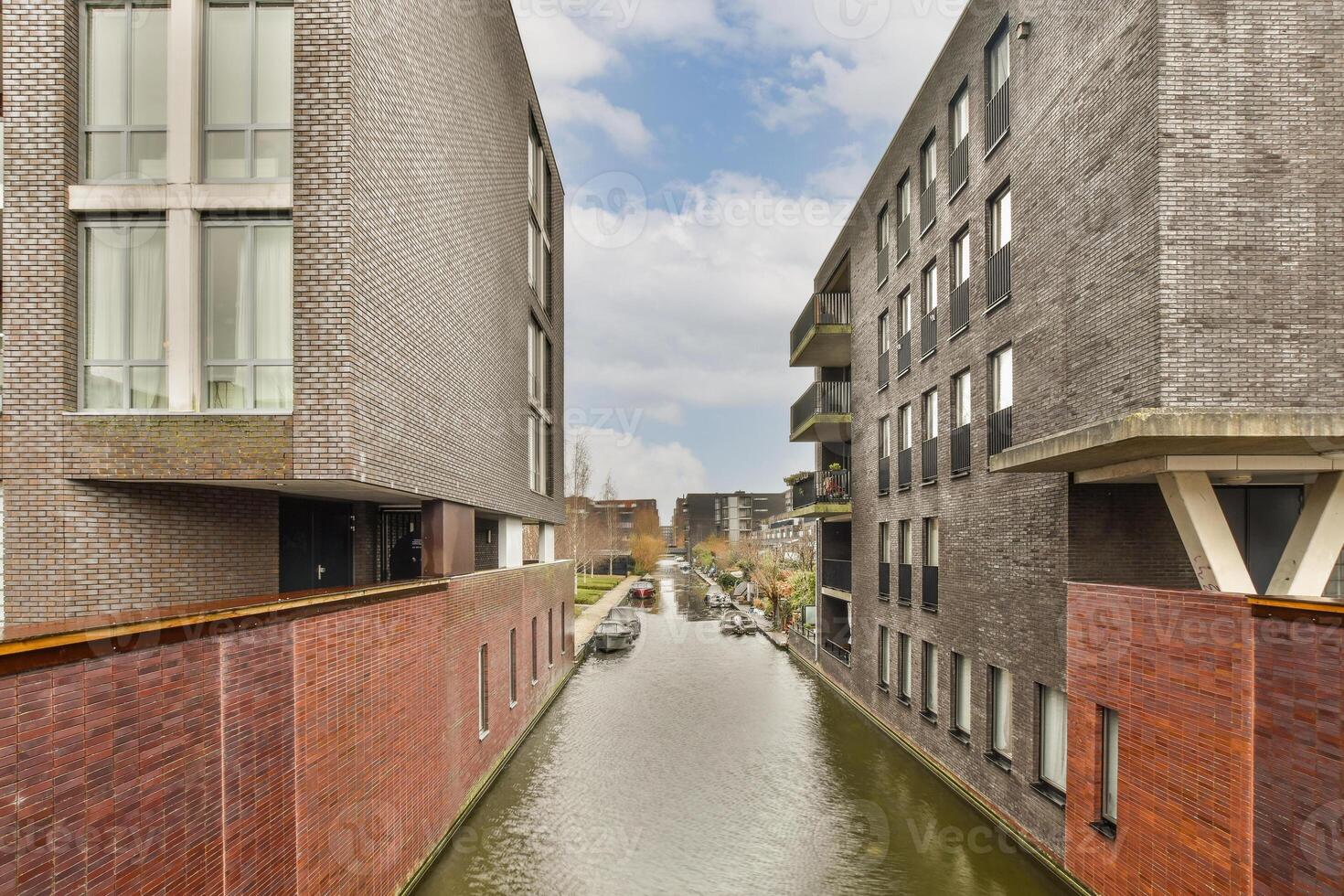 A canal with a boat in it photo