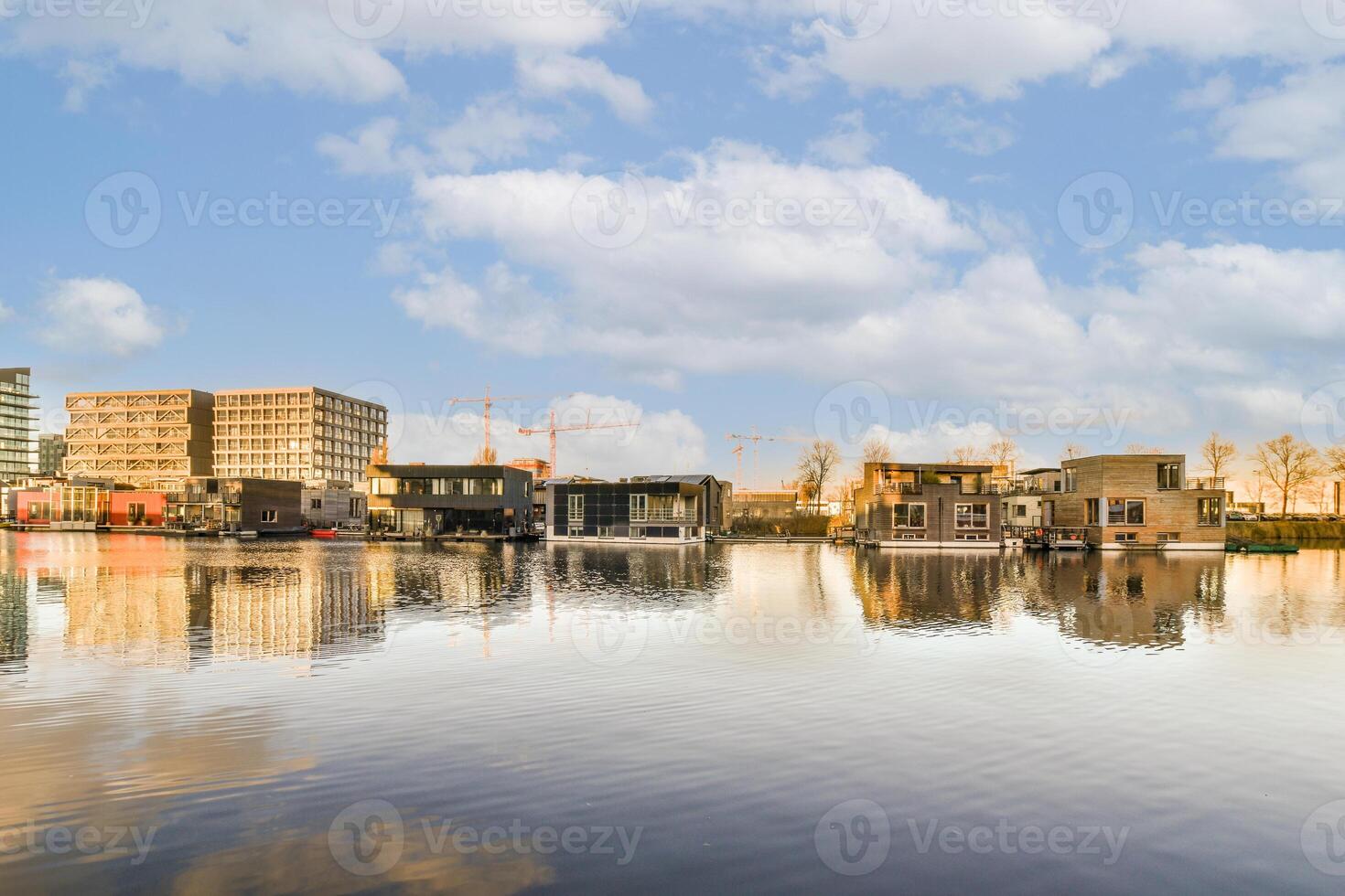 A city with buildings and water in the background photo