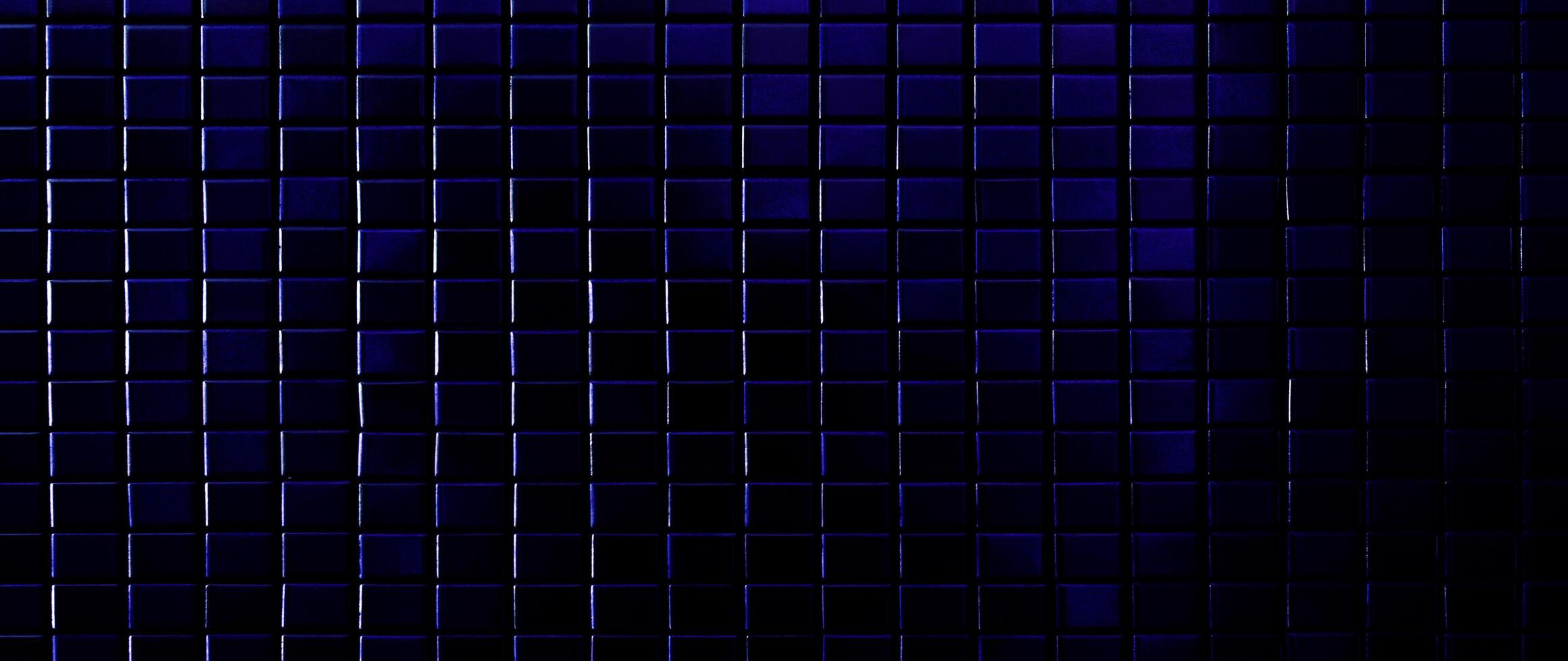 Dark color Mosaic pattern of tiles, Wall is decorated with stained glass small plate, Beautiful mosaic wall luxurious or ceramic wall for luxurious pattern background. photo