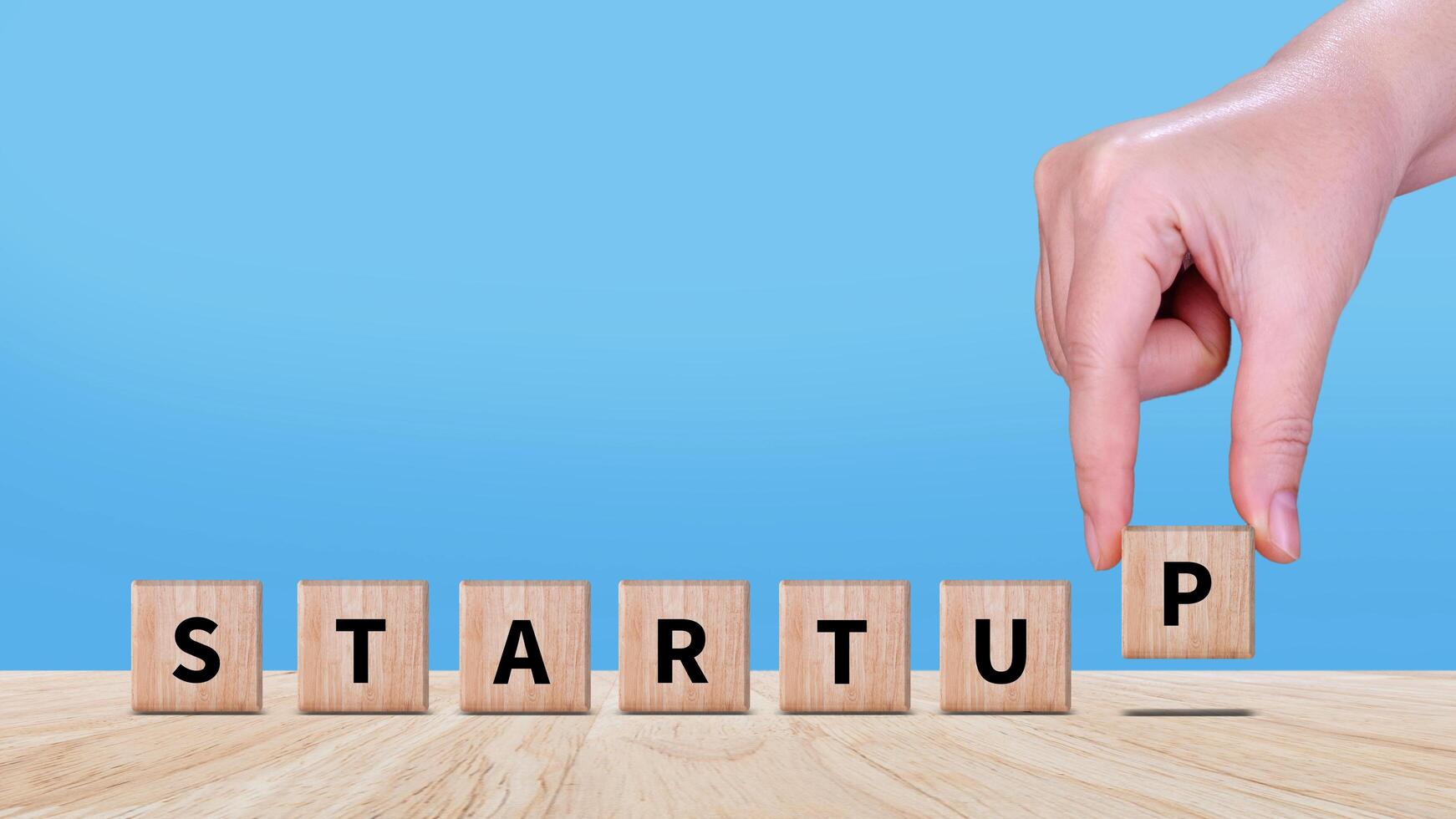 Startup business concept on wooden block, fast business success, startup founder, network connection, idea generation, digital marketing success. photo