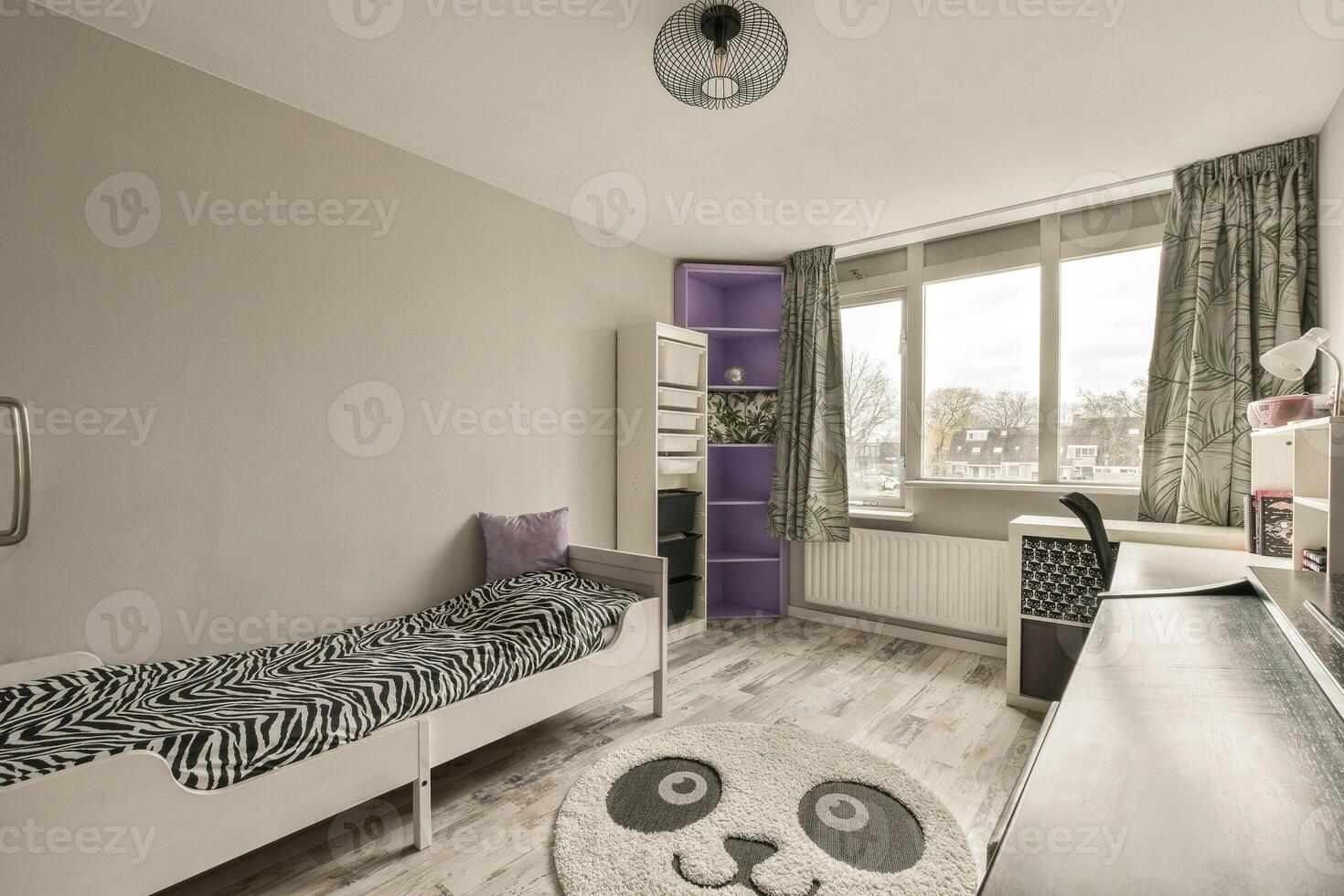 A bedroom with a zebra rug and a bed photo