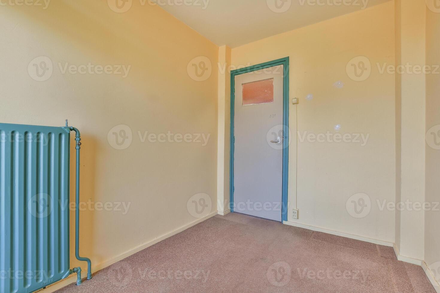A room with a radiator and a door photo