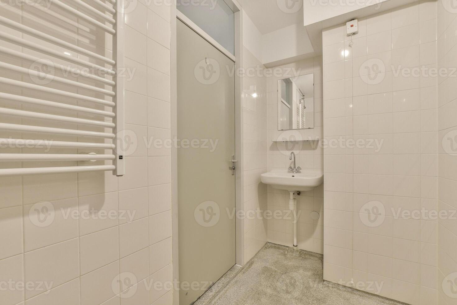 A bathroom with a sink and a shower photo