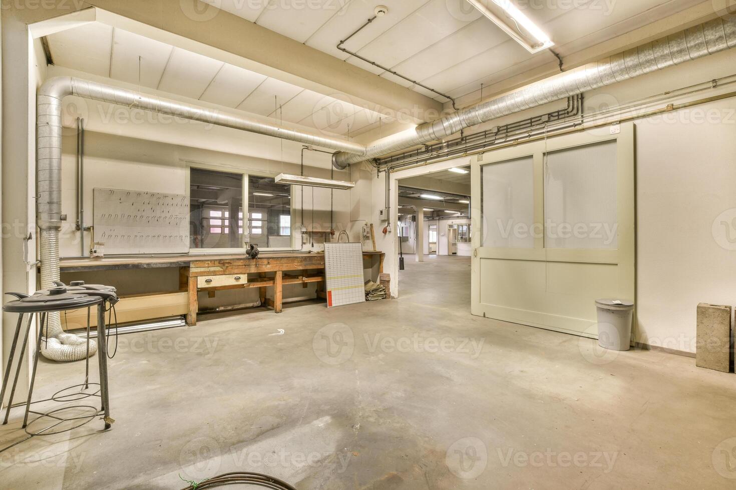 An empty room with a large open door photo