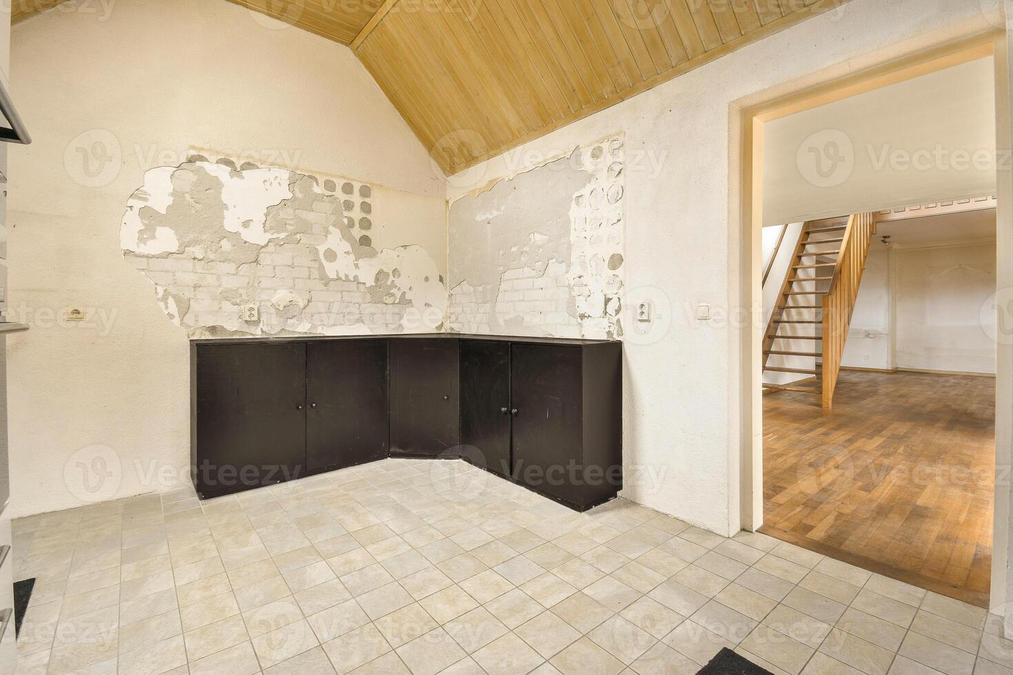 A kitchen with a wall with a map on it photo