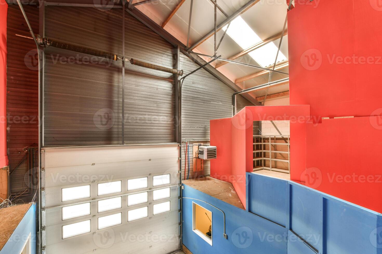 A room with red, blue and yellow walls photo