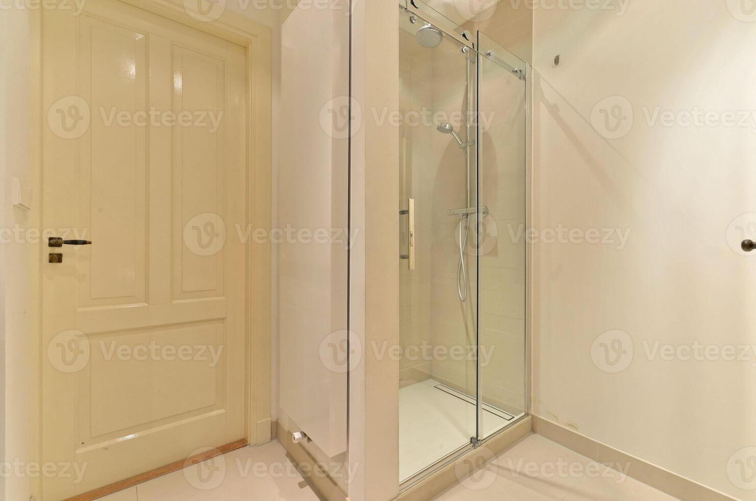 A bathroom with a shower and toilet in it photo