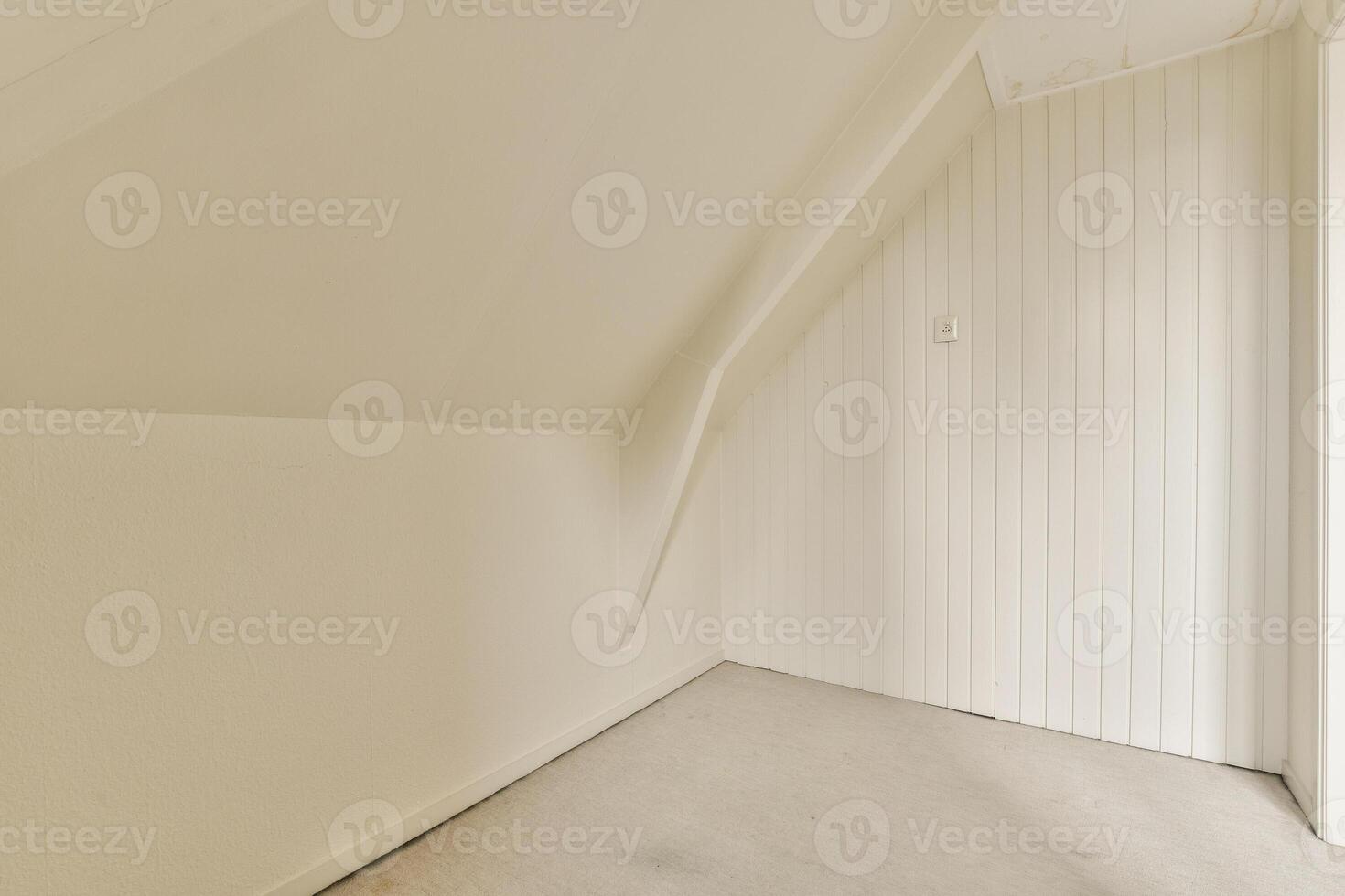 A white room with a window and a door photo