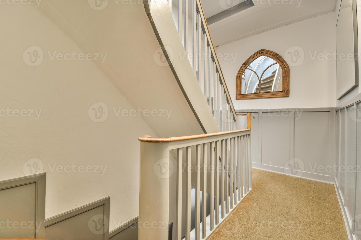 A stairway with a railing photo