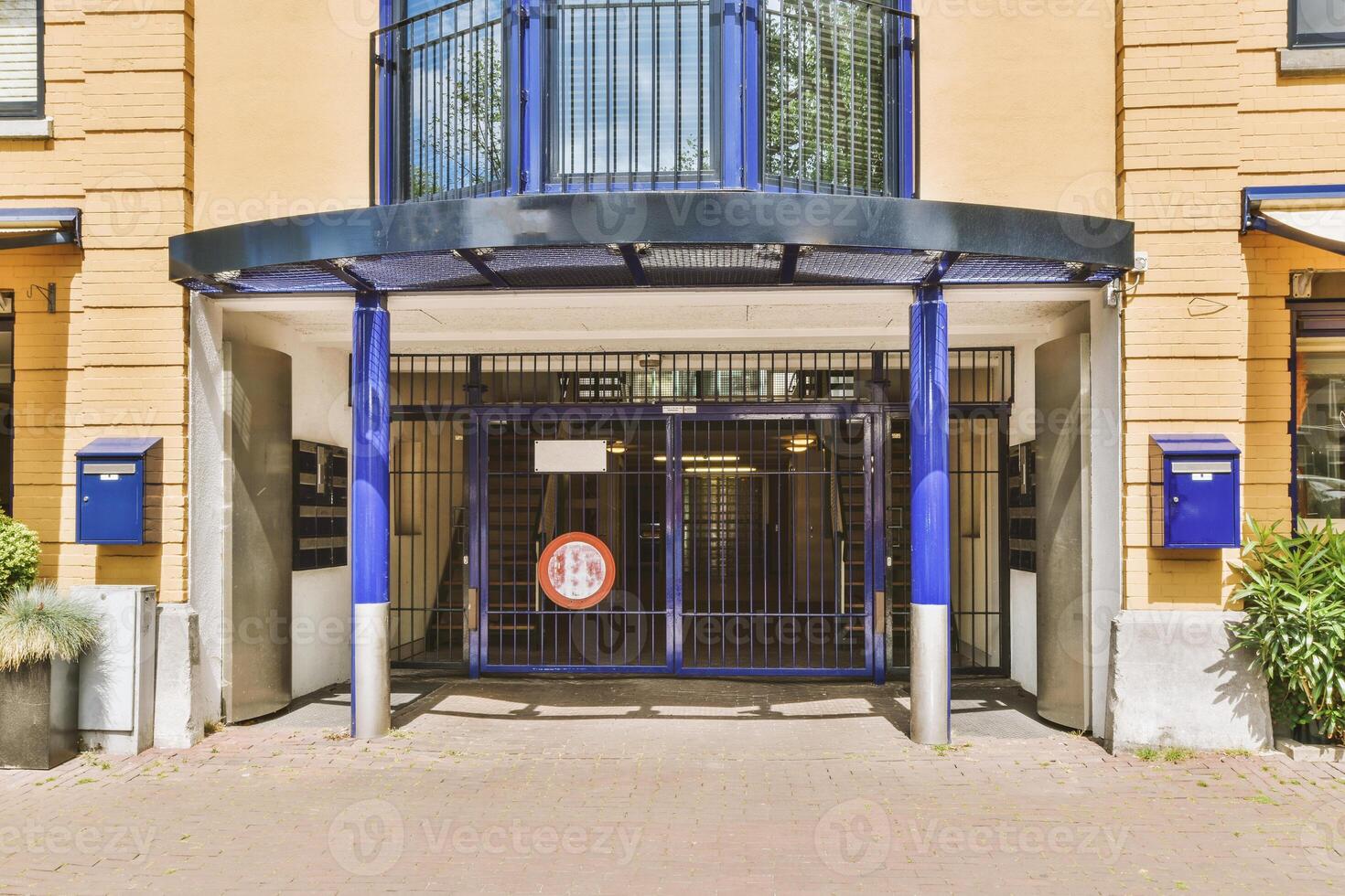 A large building with a blue and white sign photo