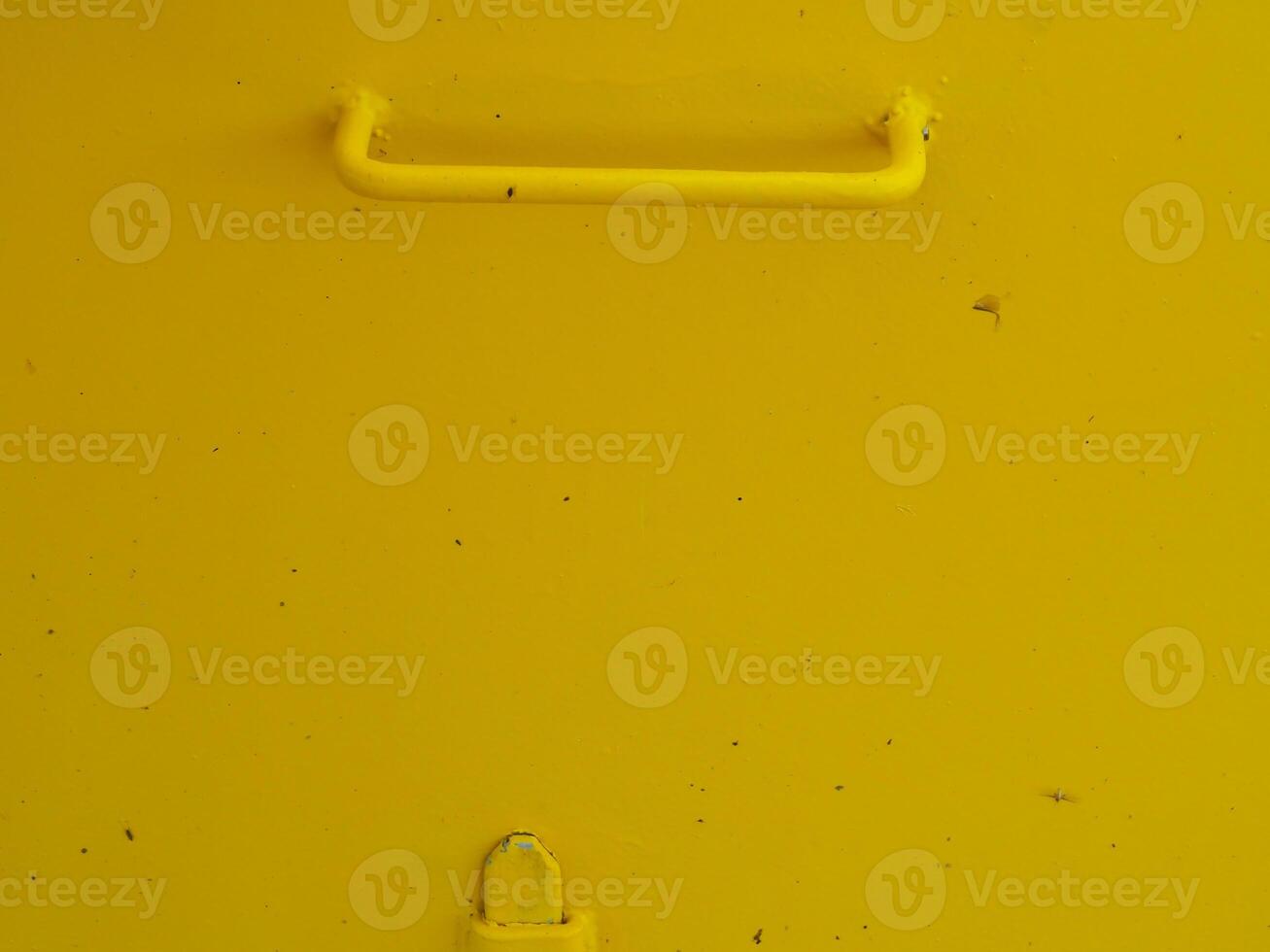 Yellow painted steel texture for a close-up background of a building or construction. photo