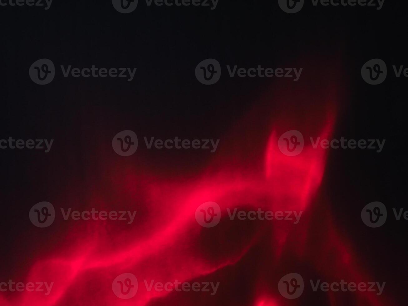 Red reflection in the dark for mysterious abstract background. photo