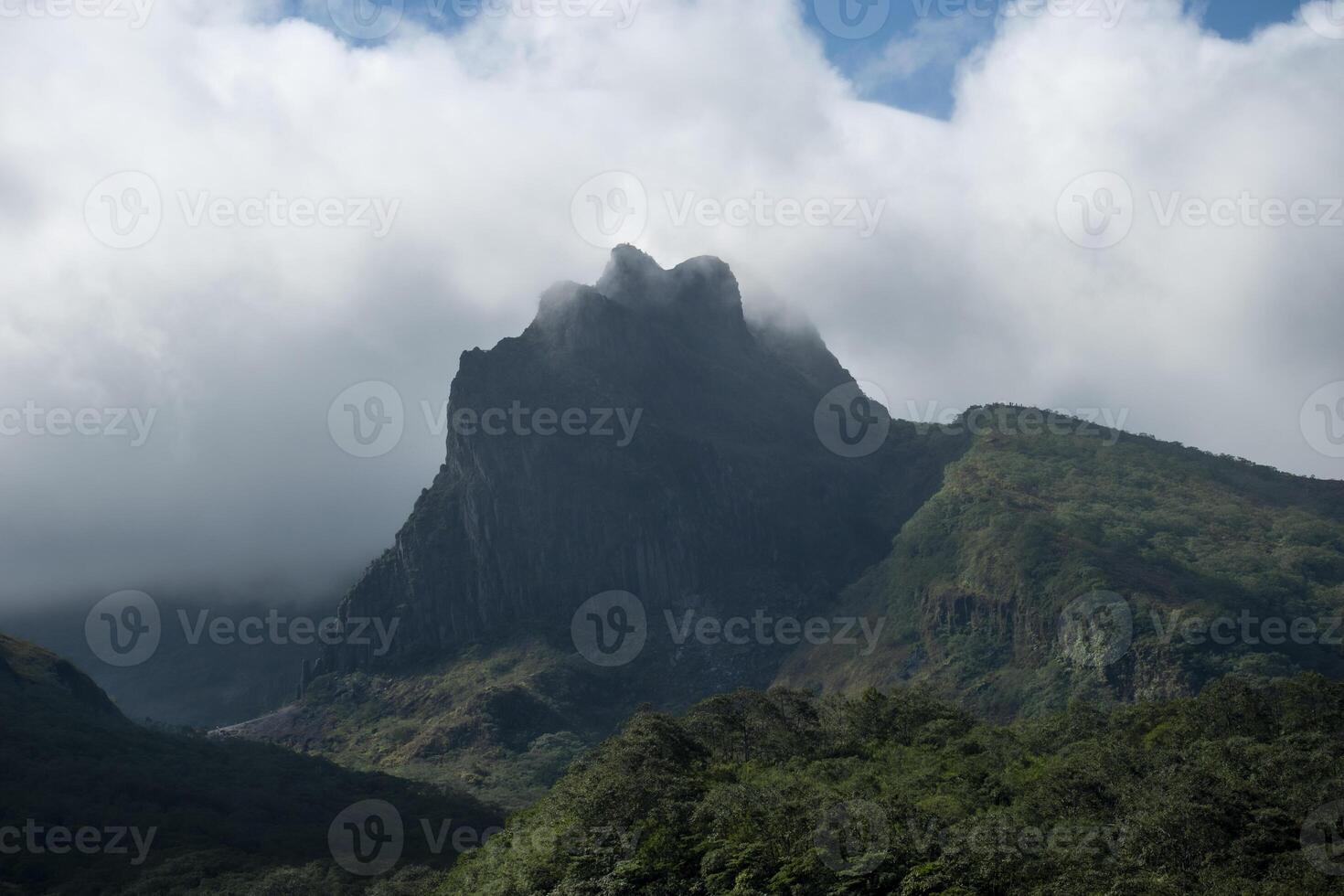 Beautiful view of Mount Kelud under the cloudy sky, one of the active volcanoes in East Java, Indonesia. photo