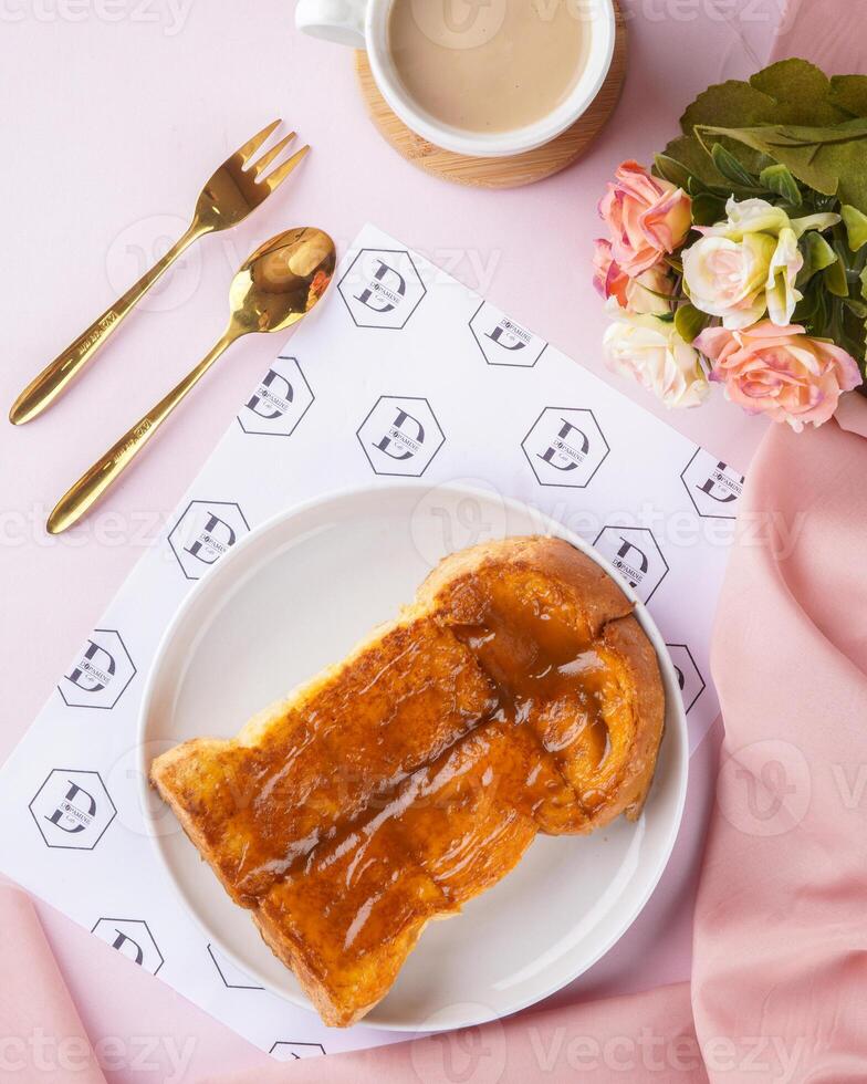 roti bakar is usually prepared as a sandwich of grilled white bread with a filling, consumed both as a light breakfast and a common street food. photo