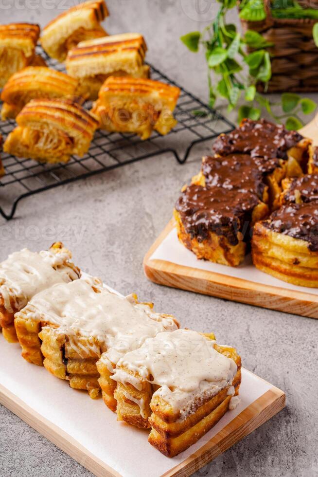 Roti Bakar Bandung or Bandung Bread Toast is Popular Street Food from Bandung. Roti bakar refers to toast, served often with butter, cheese, stwarberry jam, Green tea, crushed peanuts and sugar, photo